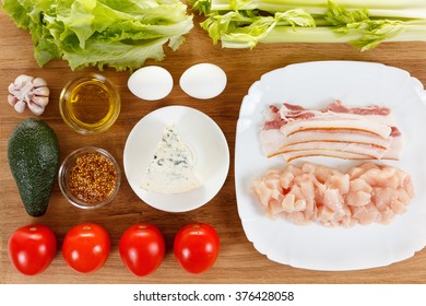 Ingredients For Cooking Traditional American Cobb Salad - Colorful Entree With Bacon, Chicken, Eggs And Tomato