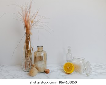 Ingredients For Eco-friendly Homemade Cleaning Products And Laundry Detergent Such As Essential Oil, Lemon, Vinegar And Soda Crystals