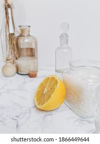 Ingredients For Eco-friendly Homemade Cleaning Products And Laundry Detergent Such As Essential Oil, Lemon, Vinegar And Soda Crystals