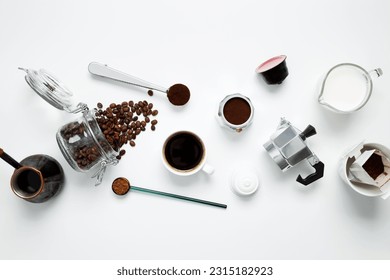 Ingredients for making coffee. Different ways to make geyser moka coffee maker, metal cezve, machine capsules. Coffee making concept. Flat Lay. Top view