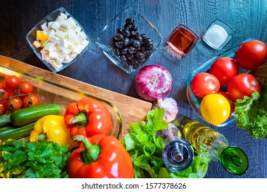 Ingredients For Making Greek Salad. Salad Ingredients Top View. Paprika. Chees Feta. Black Olives. Tomatoes Onion. Concept - Learn How To Cook Greek Salad. Be A Cook. Do-it-yourself Cooking.