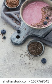 Ingredients For Making Pink Yogurt Smoothie Bowl With Fresh Blueberry And Seeds