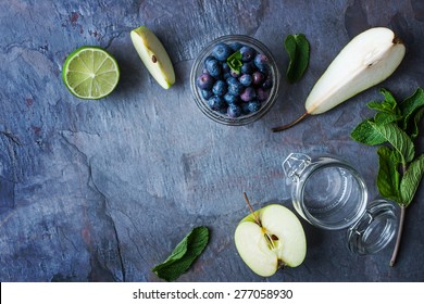 Ingredients For Smoothie From Apple, Pear And Blueberry On The Stone Table