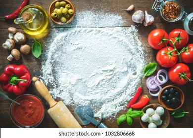 Ingredients and spices for making homemade pizza. Top view with copy space on wooden table  - Powered by Shutterstock