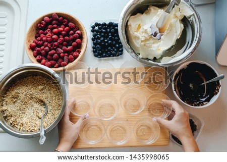 Similar – Zutaten für ein gesundes Frühstück mit Joghurt, Beeren und Chiasamen. Eine leere Schüssel, Draufsicht.