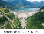 Inguri hydroelectric power plant in Georgia. Aerial view from drone of huge water dam. Hydropower energy station on Inguri River