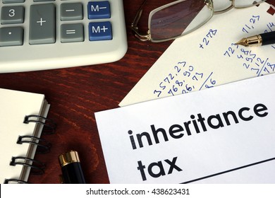 Inheritance tax written on a paper.  - Shutterstock ID 438623431