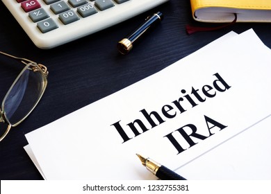 Inherited IRA Documents On A Table. Retirement Plan.