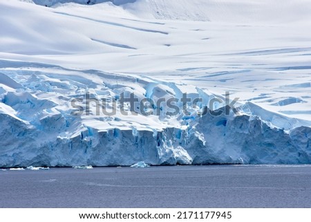 Inhospitable terrain on beautiful blue Antarctica.