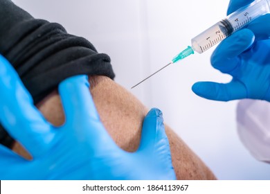 Injecting The Coronavirus Vaccine To An Old Lady, Antibodies, Immunize Population. Side Effects, Risk People, Antibodies, New Normal, Covid-19.