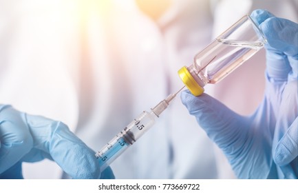 injecting injection vaccine medicine flu - Shutterstock ID 773669722
