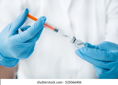 injecting injection vaccine vaccination medicine flu man doctor insulin health drug influenza concept - stock image