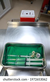 The Injection Medicine Set Is On Stainless Steel Cart, Close Up On Syringes Are In Tray.