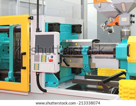 Injection moulding machine for plastic parts production