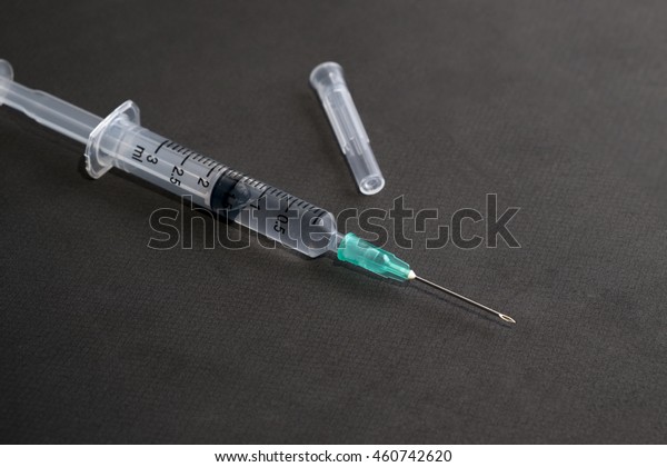 Injection Needle Syringe Cap On Black Stock Photo (Edit Now) 460742620