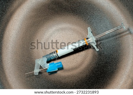 injection solution, syringe and needle