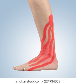 Injured Ankle Treated With Therapy Tape . 