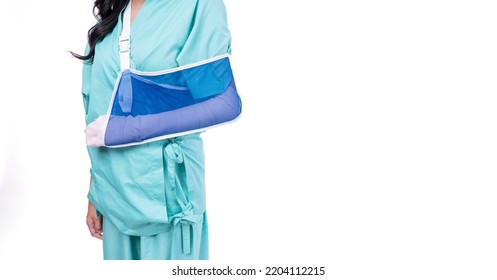 Injured Asian Woman Wear Patient Broken Wrist Arm Hand With Splint Soft With Copy Space On White Background.Injury Female Orthopedic Broken Arm Splint Hand Accident Over Isolated.Advertising Insurance