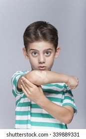 Injured Boy With Bruise On His Arm