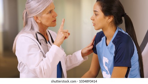 An Injured Soccer Player Is Tested For A Concussion