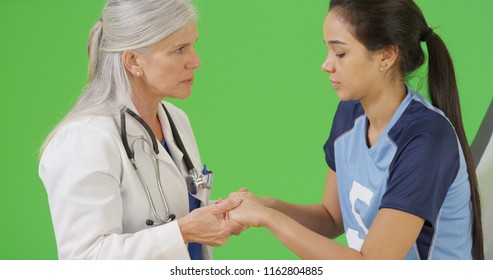 An Injured Soccer Player Is Tested For A Concussion On Green Screen