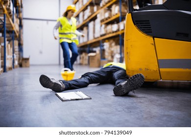An injured worker after an accident in a warehouse.