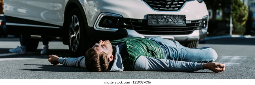 Injured Young Man Lying On Road Stock Photo 1219327036 | Shutterstock