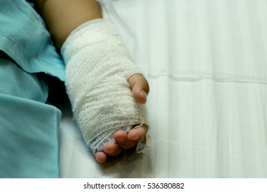 Injury To A Child By The Hand Bandaged