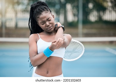 Injury, Pain And Elbow Of Tennis Woman Player With Sad, Hurt Or Crying Emotion During Match, Game Or Training Outdoor. Sports Fitness Athlete Person With Bone Health Stress Or Medical Sport Emergency