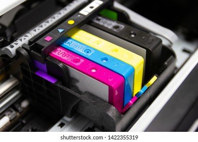 An ink cartridge or inkjet cartridge is a component of an inkjet printer that contains the ink four color - Shutterstock ID 1422355319