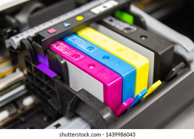An ink cartridge or inkjet cartridge is a component of an inkjet printer that contains the ink four color - Shutterstock ID 1439986043