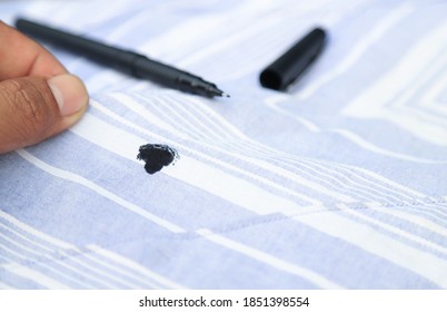 Ink Stain On Cloth From Accident In Using Pen. Dirt Stains For Cleaning And Washing Concept For Housewife