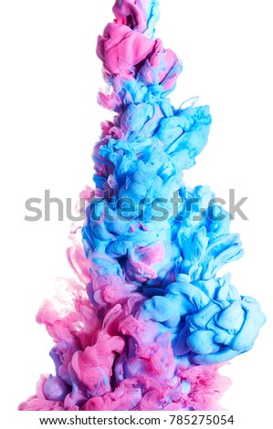 ink in the water. A splash of blue and pink paint. Abstract background