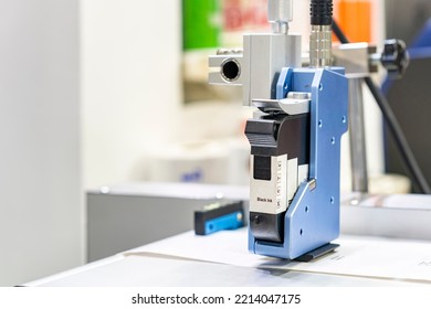 Inkjet print head component of continuous label or graphics printer machine for manufacturing process in industrial - Shutterstock ID 2214047175