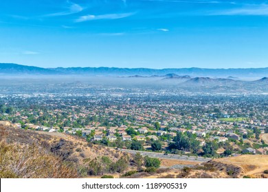 Inland Empire Of California With Hills And Homes In Distance With Sky For Copy Text