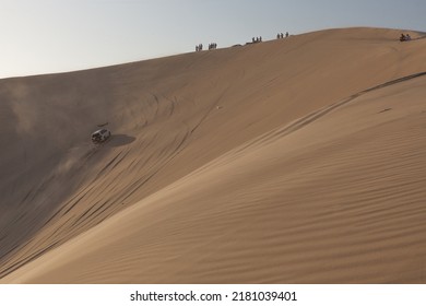 INLAND SEA, QATAR - OCTOBER 13, 2017: Qatari Men Meet On The Weekend In The Emirate's South-eastern Corner To Practice Dune Bashing, A Form Of Off-roading In The Sand Dunes.