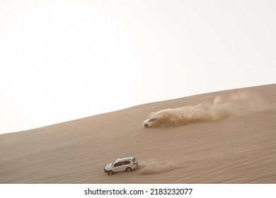 INLAND SEA, QATAR - OCTOBER 13, 2017: Qatari Men Meet On The Weekend In The Emirate's South-eastern Corner To Practice Dune Bashing, A Form Of Off-roading In The Sand Dunes.