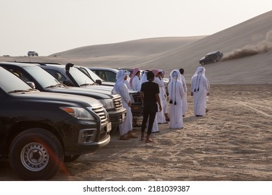 INLAND SEA, QATAR - OCTOBER 6, 2017: Qatari Men Meet On The Weekend In The Emirate's South-eastern Corner To Practice Dune Bashing, A Form Of Off-roading In The Sand Dunes.