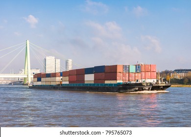  Inland shipping transport on the rhine river with containers, Large container vessel on the river rhein by Cologne
