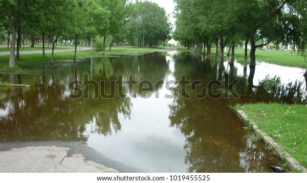 Inland water\
after heavy raining in a car\
park
