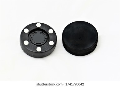 An Inline Hockey Puck And An Ice Hockey Puck Compared