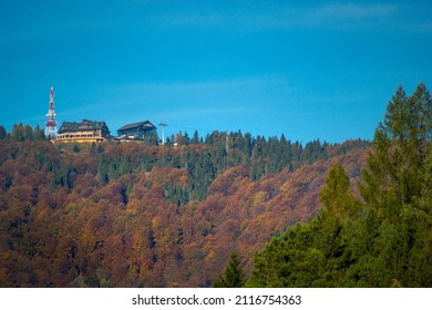 Inn building and Top station of Gondola Lift on Jaworzyna Krynicka Mountain in autumn, Poland. - Shutterstock ID 2116754363