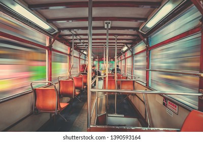 Inner view of Hong Kong double deck tram with motion blur effect.