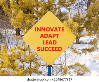 Innovate adapt lead succeed symbol. Concept words Innovate Adapt Lead Succeed on beautiful yellow road sign. Beautiful winter forest background. Business innovate adapt lead succeed concept Copy space - Powered by Shutterstock