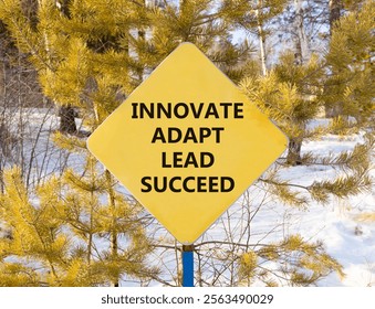 Innovate adapt lead succeed symbol. Concept words Innovate Adapt Lead Succeed on beautiful yellow road sign. Beautiful winter forest background. Business innovate adapt lead succeed concept Copy space - Powered by Shutterstock