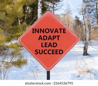 Innovate adapt lead succeed symbol. Concept words Innovate Adapt Lead Succeed on beautiful red road sign. Beautiful winter forest background. Business innovate adapt lead succeed concept. Copy space - Powered by Shutterstock