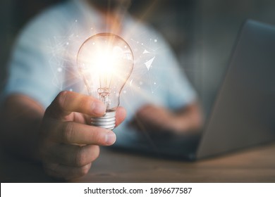 Innovation. Hands holding light bulb for Concept new idea concept with innovation and inspiration, innovative technology in science and communication concept, 
