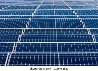 Innovation to meet the Sustainable Development Goals by creating solar panel fields and adding wind mill turbines to create energy in a new way without polluting power plants  - Shutterstock ID 1926954689