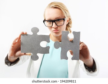 Innovative Ideas - A Perfect Match Attractive Woman In Business Outfit Adjusts The Pieces Of The Puzzle 