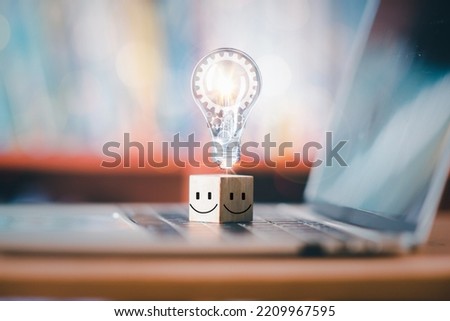 Innovative learning, creative educational study concept for graduation and school student success with world lightbulb of knowledge planting on opening old big book in library with textbook
